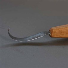 Spoon knife right hand compound curve